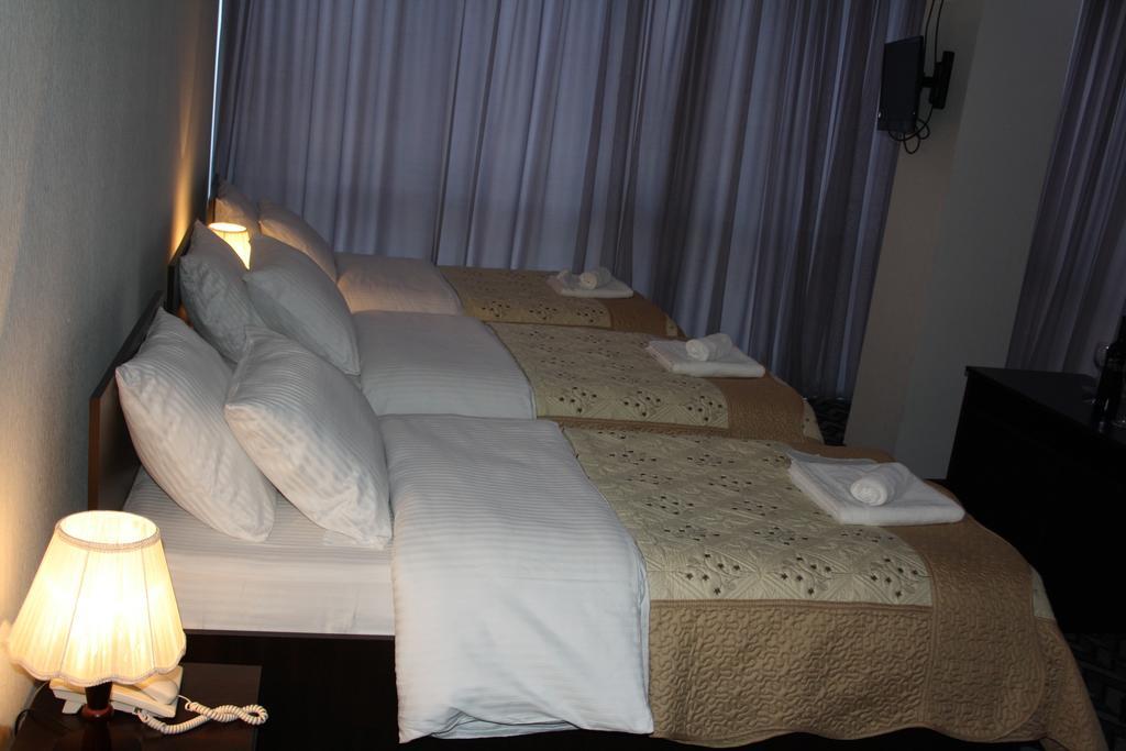 Hotel Royal Georgia Tiflis Habitación foto