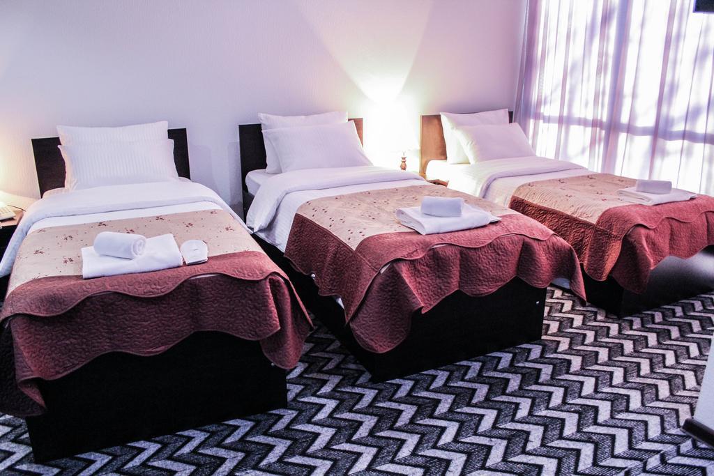 Hotel Royal Georgia Tiflis Habitación foto